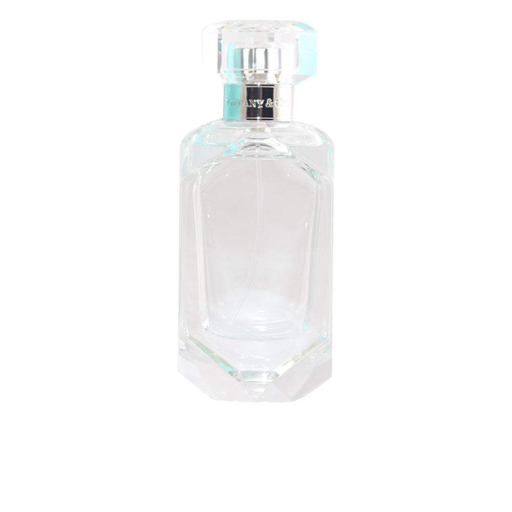 75 ml clear glass perfume bottle with pale floral fragrance, spray cap
